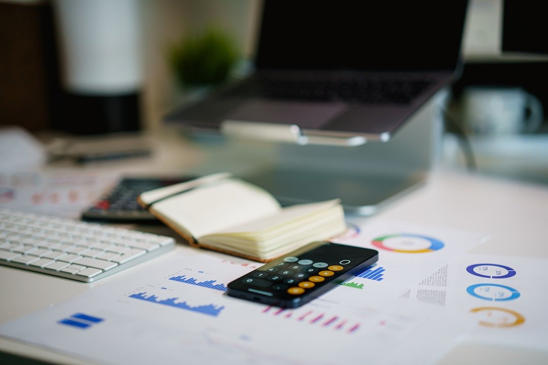 Founder reviewing a marketing budget and financial calculations